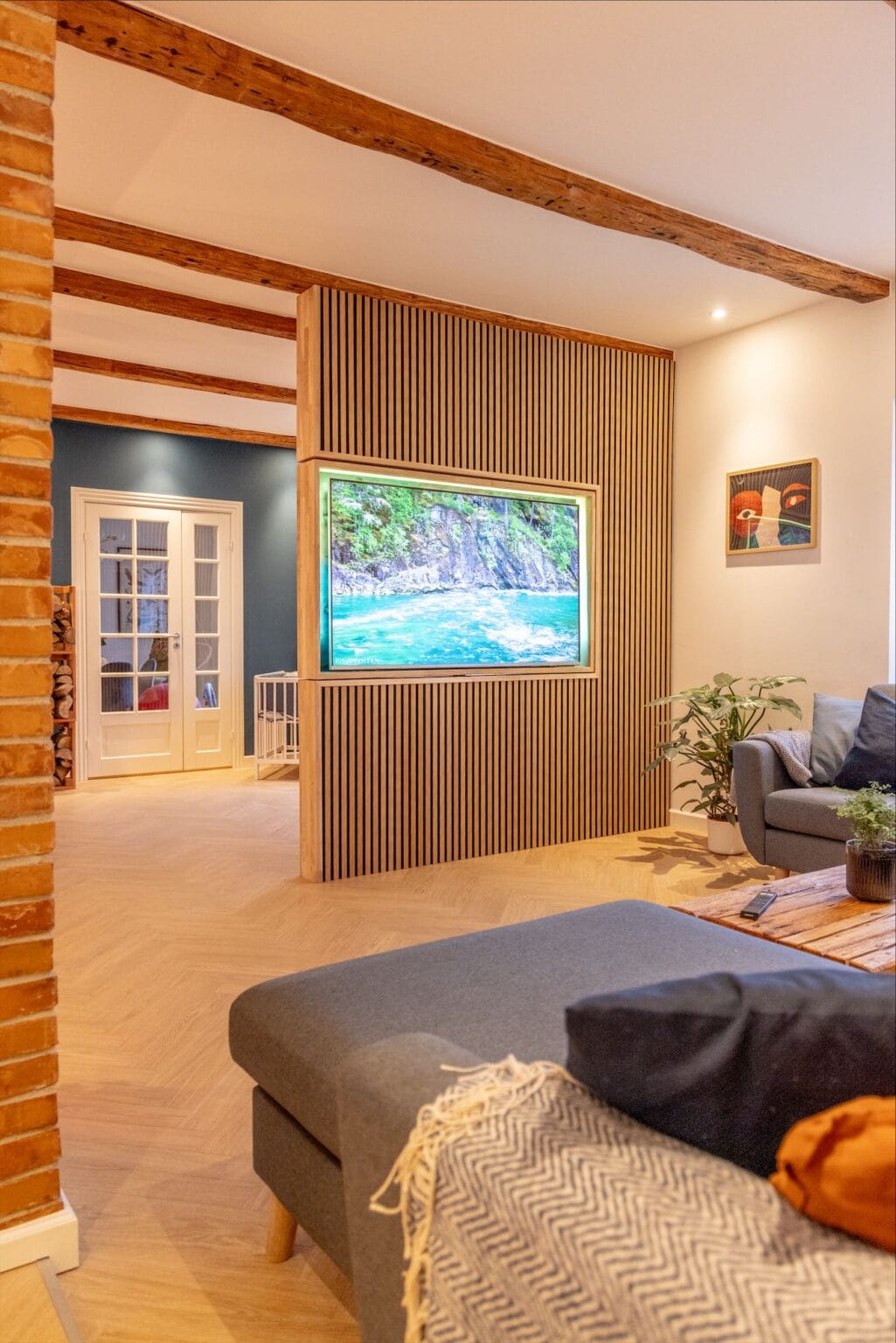 Cozy living room with modern decor and large screen TV
